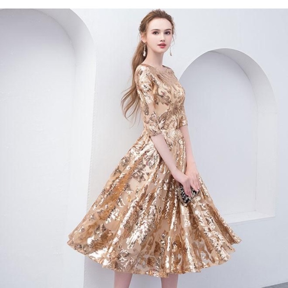 Beautiful fit and flare sequined gold dress